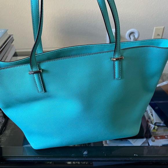 Kate spade tote with inside zipper pocket and two pockets on other side. - Picture 6 of 14